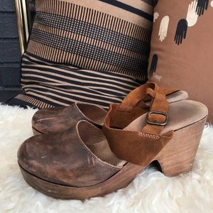 Brown leather and wood platform clogs